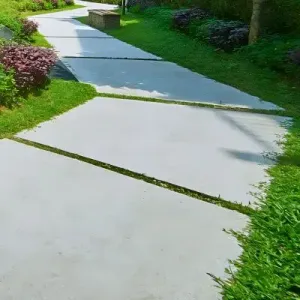 Completed concrete walkway in a residential area in Alicetown.