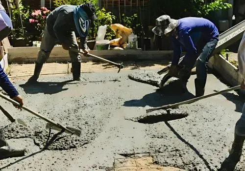 Concrete workers pouring foundation demonstrating how Lower & Upper Hutt Concrete Services operates.