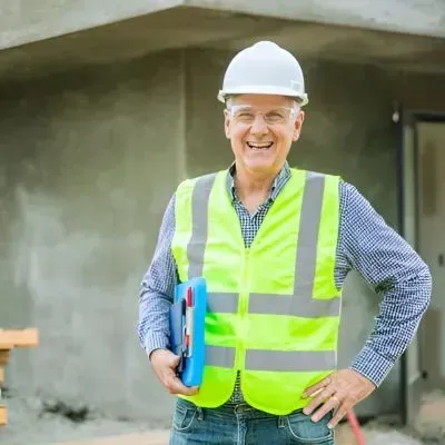 Hutt City Councilman reviewing exposed aggregate site in Naenae.