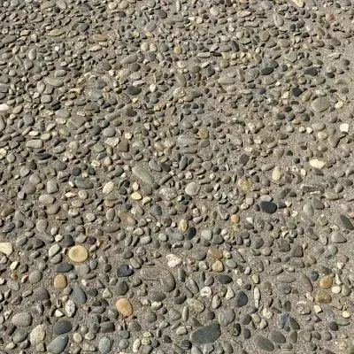 Close up of exposed aggregate concrete driveway in Eastbourne, Lower Hutt, showing texture and finish.