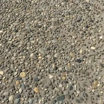Close up of exposed aggregate concrete driveway in Eastbourne, Lower Hutt, showing texture and finish.