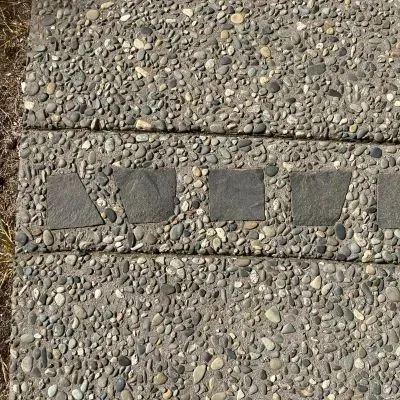 Aerial view of exposed aggregate concrete path in Eastbourne, Lower Hutt, highlighting the finished design.