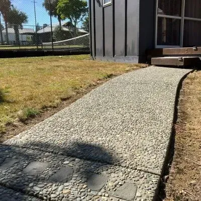 Front view of exposed aggregate concrete path in Eastbourne, Lower Hutt, installed by our team.