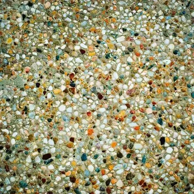Close-up of decorative exposed aggregate concrete shed slab in Maungaraki.