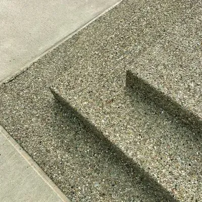 Three exposed aggregate front porch concrete steps with 1.5-meter corners in Heretaunga, Upper Hutt.