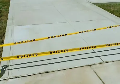 Concrete driveway with border design in Woburn, Lower Hutt, waiting to cure before use.