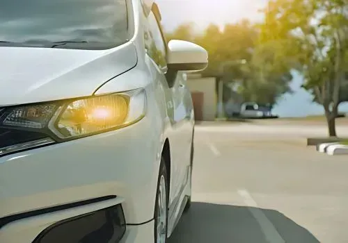A car is parked on a new concrete parking surface in Korokoro, showcasing a durable parking installation.