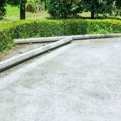 Concrete parking area installed for a residential complex, showcasing a durable surface in Eastbourne.