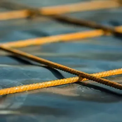 Steel reinforcement mesh installation before concrete pour for residential patio foundation in Trentham, Upper Hutt.