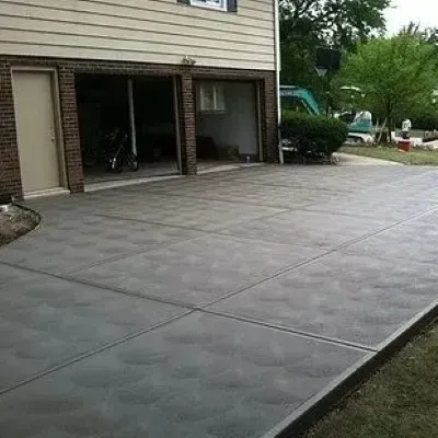 Swirl finish concrete driveway in Wingate.
