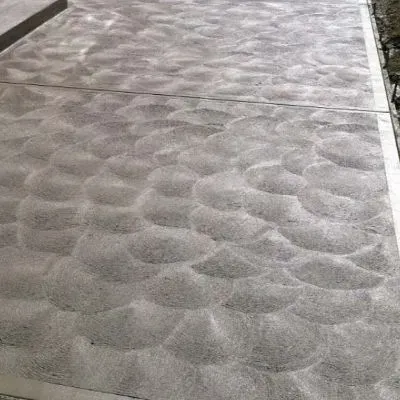 Swirl finish concrete patio completed in Normandale.