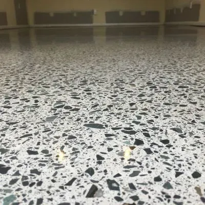 Terrazzo-style polished concrete with full aggregate exposure and coloured stone chips in Wainuiomata.
