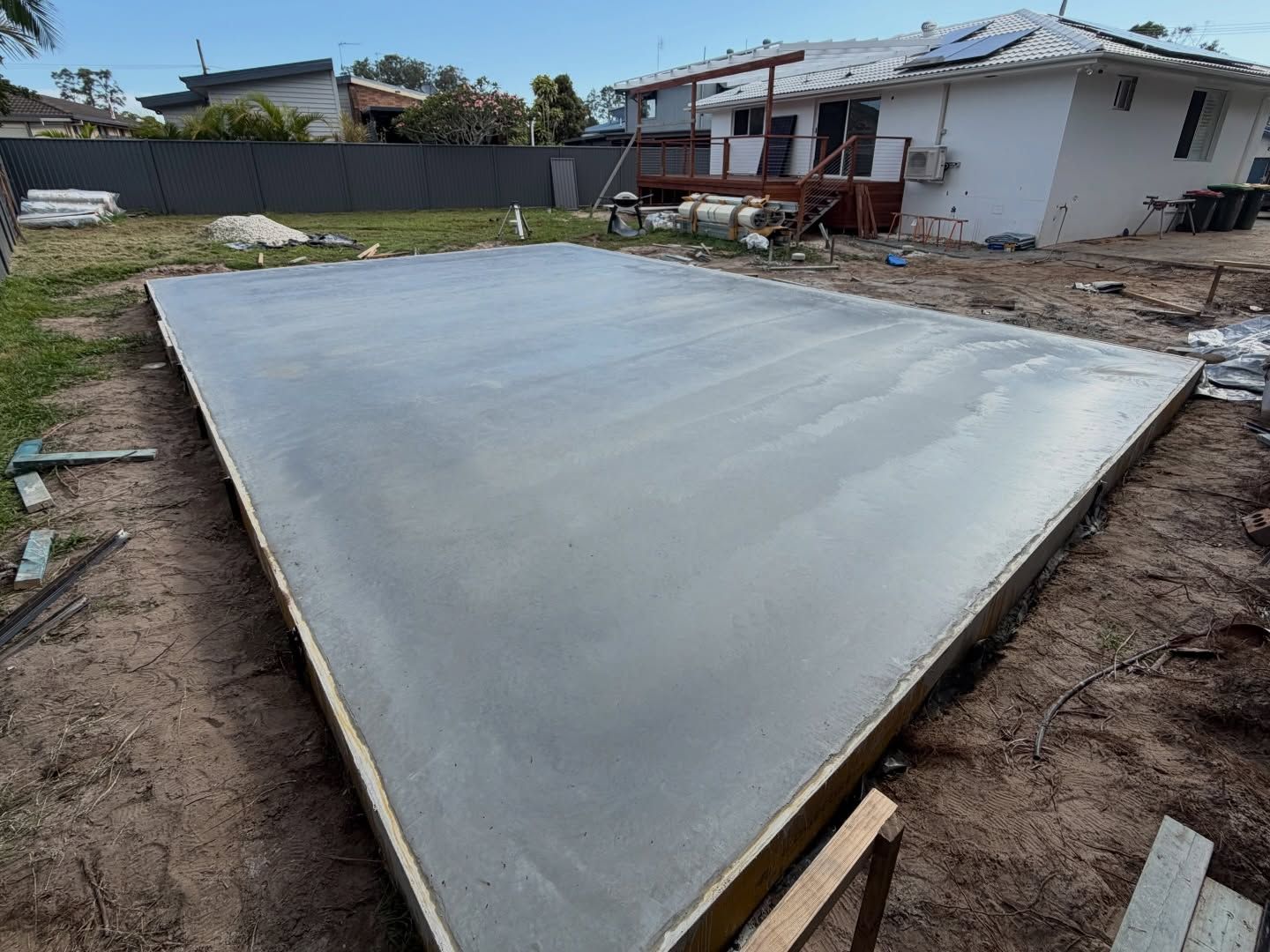 Freshly Poured Rectangular Concrete Slab in a Backyard, Ready for Construction — All Concrete Creations in Kingscliff, NSW