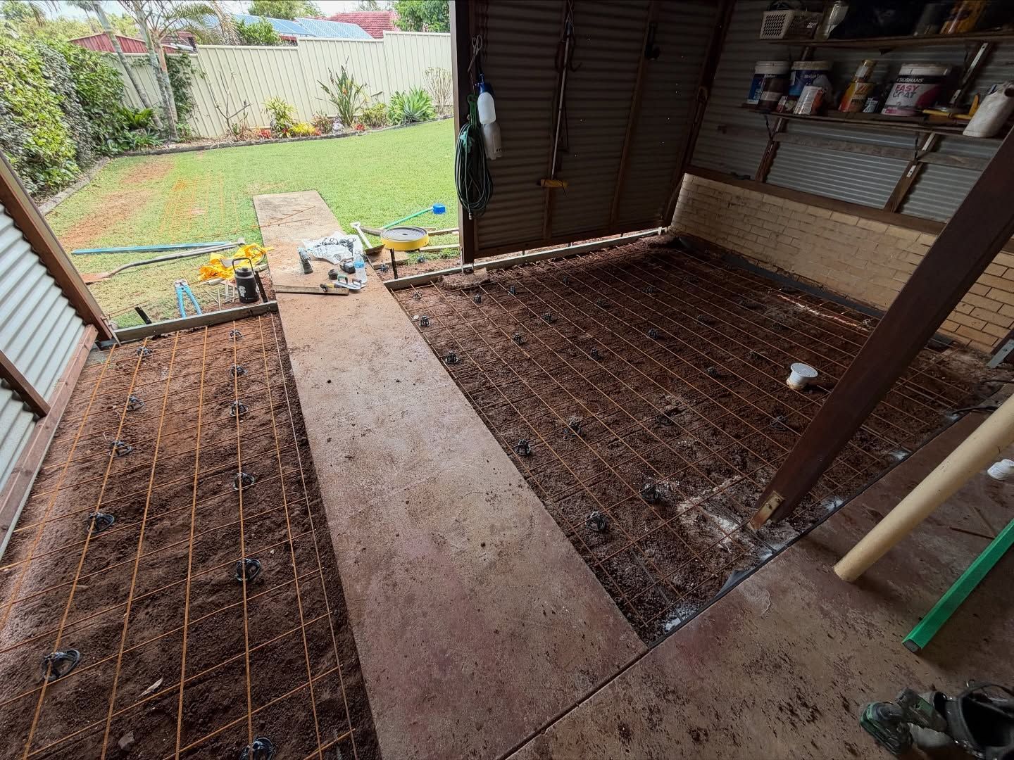 Inside a Shed, Concrete Floor Under Construction With Rebar Grids — All Concrete Creations in Robina, QLD