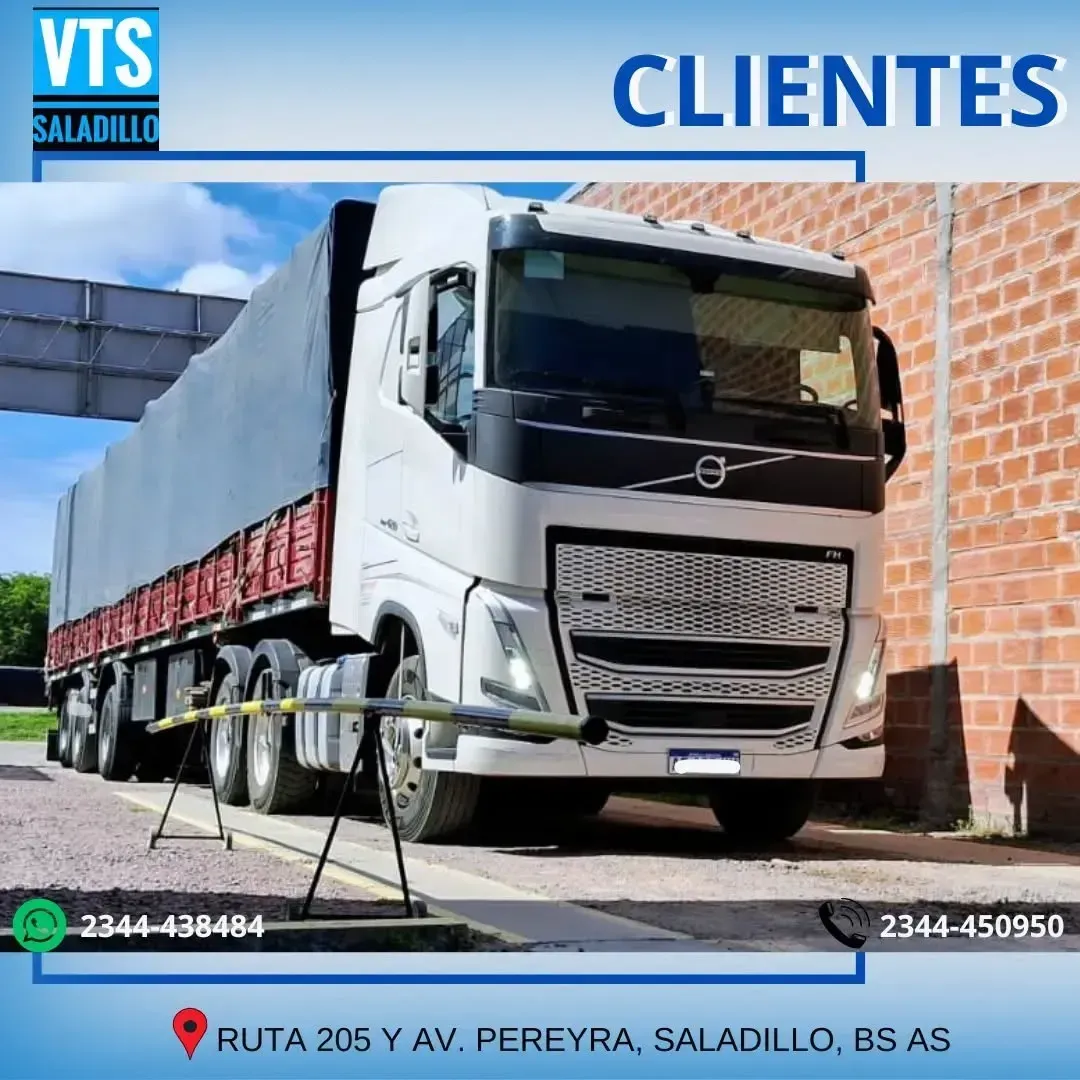 Camión blanco para clientes de VTS Saladillo, con información de contacto y dirección.