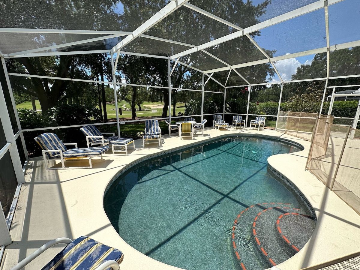 The front of a house with a white garage door