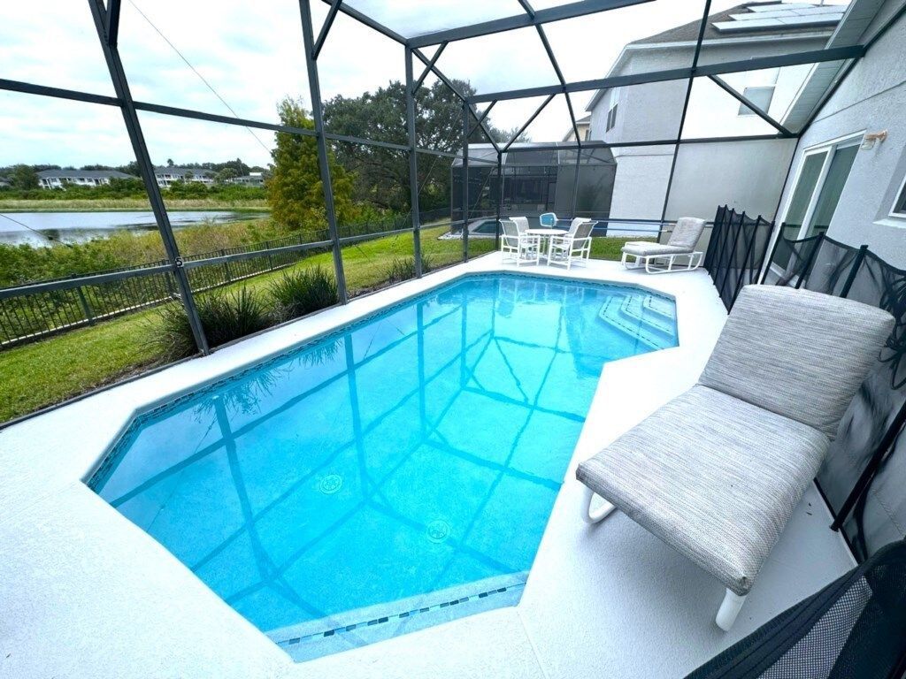 A house with a palm tree in front of it