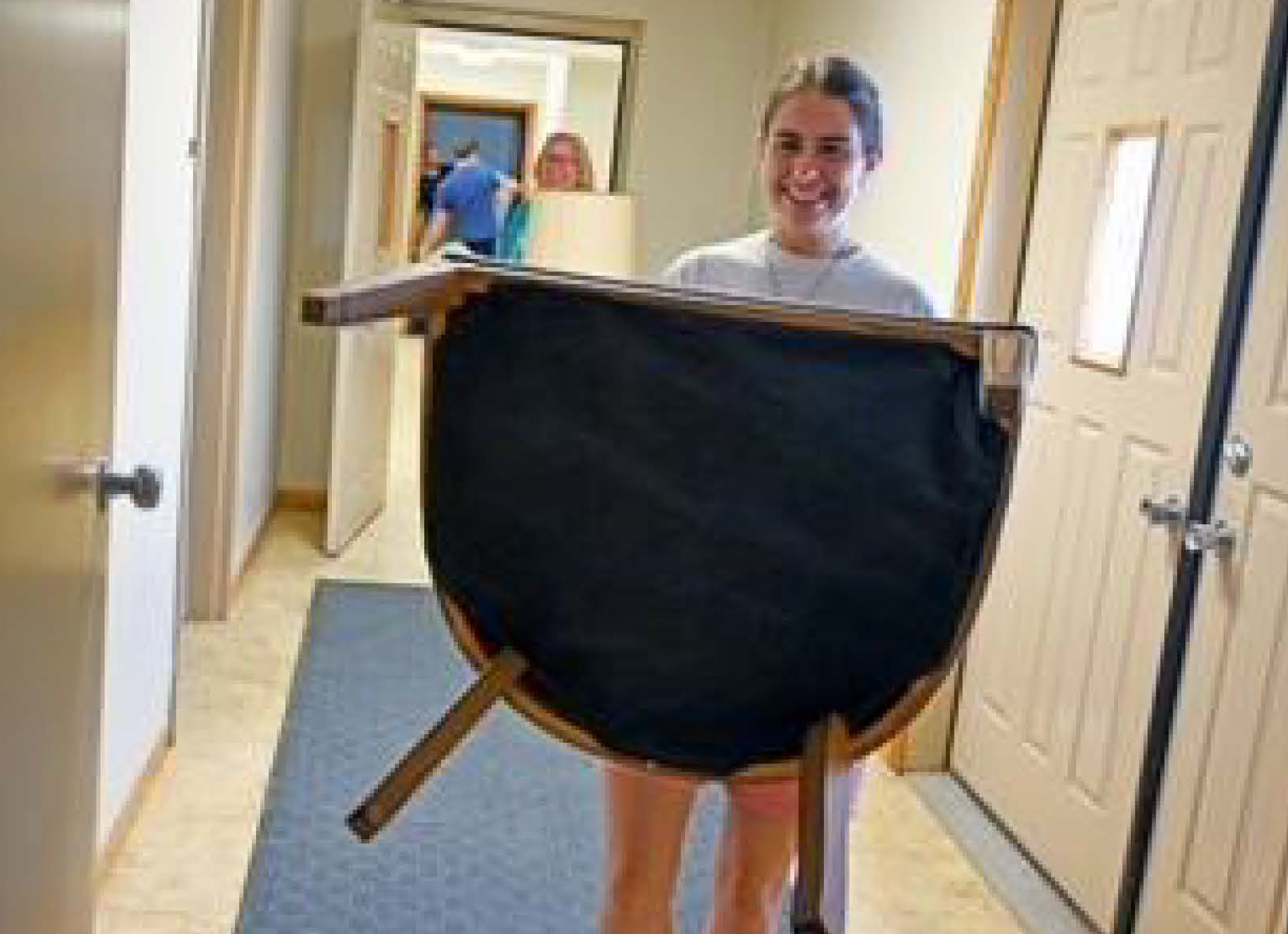 student holding a table