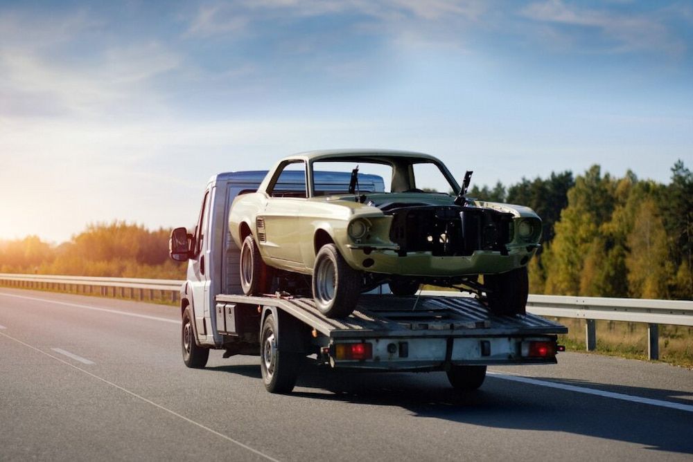 Tow Truck Transporting a Classic — Aura Towing Service in Nirimba, QLD