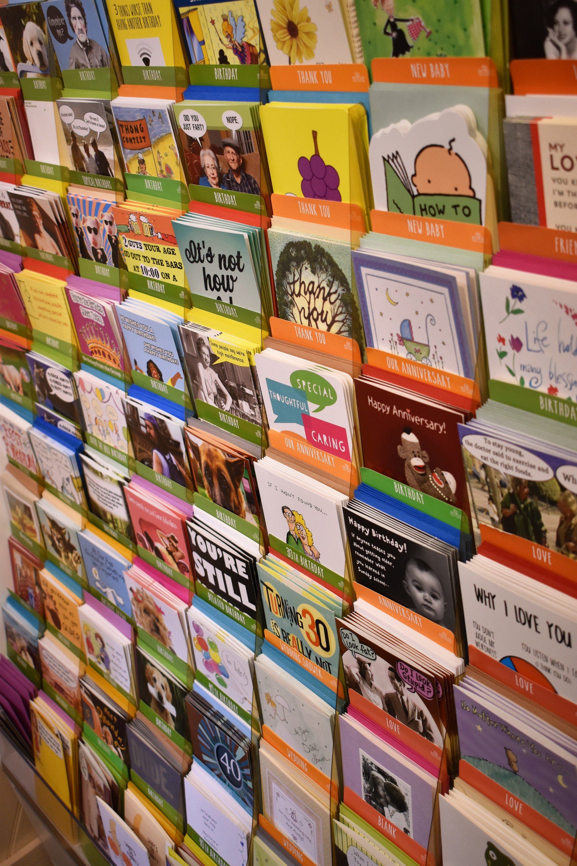 A display of greeting cards including one that says i love you