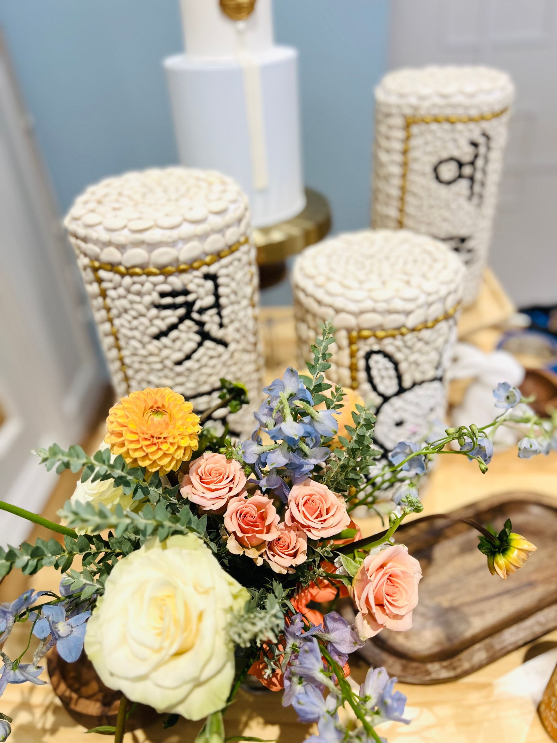 Blue and orange first birthday theme with flowers