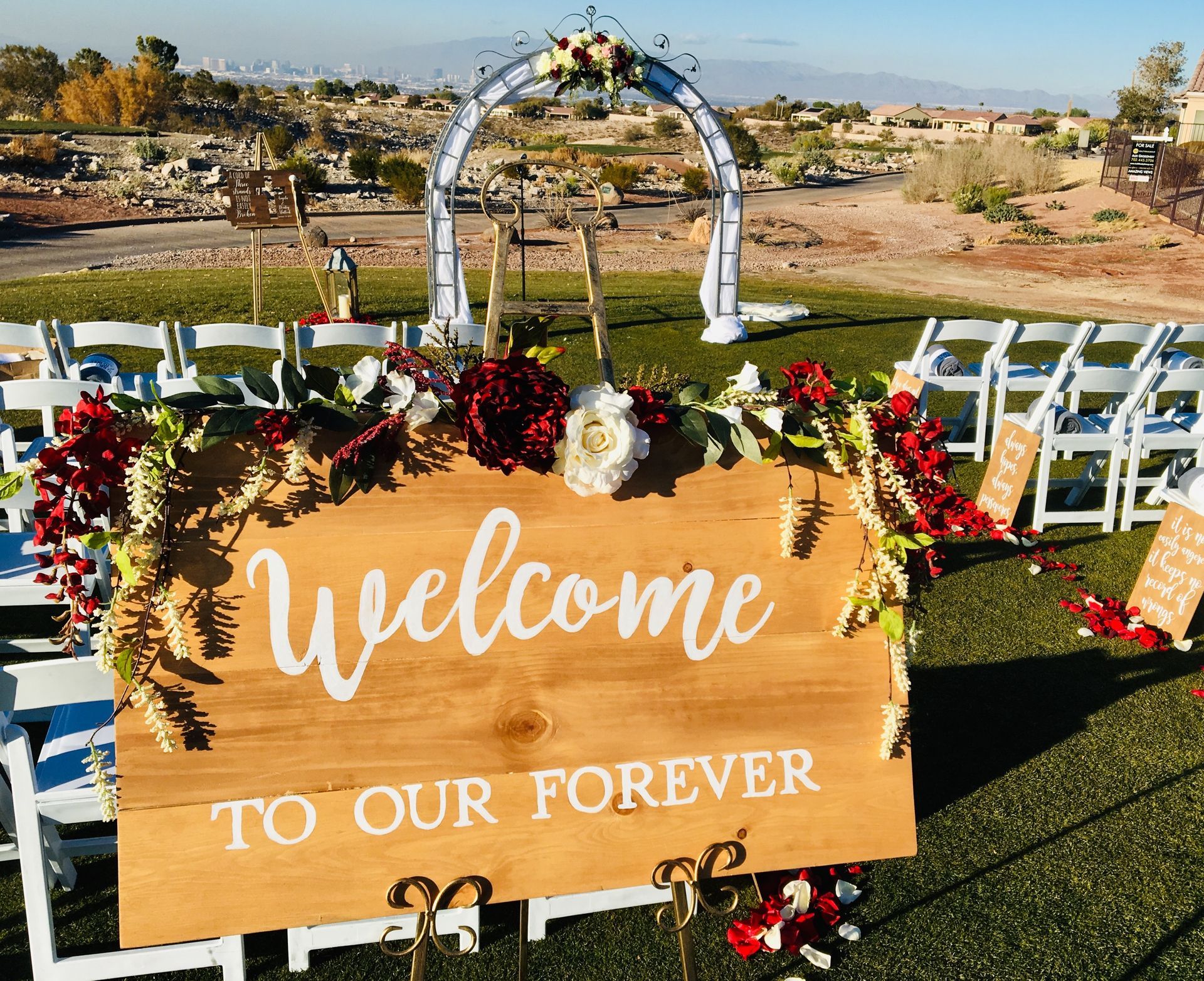 A wooden sign that says welcome to our forever