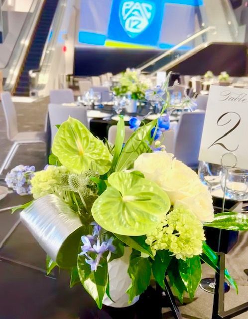 A table with flowers and a number 2 on it