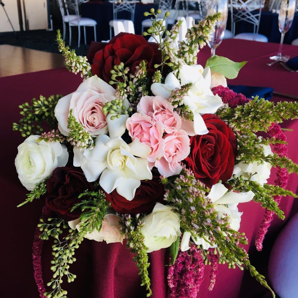 A table with a bunch of flowers on it