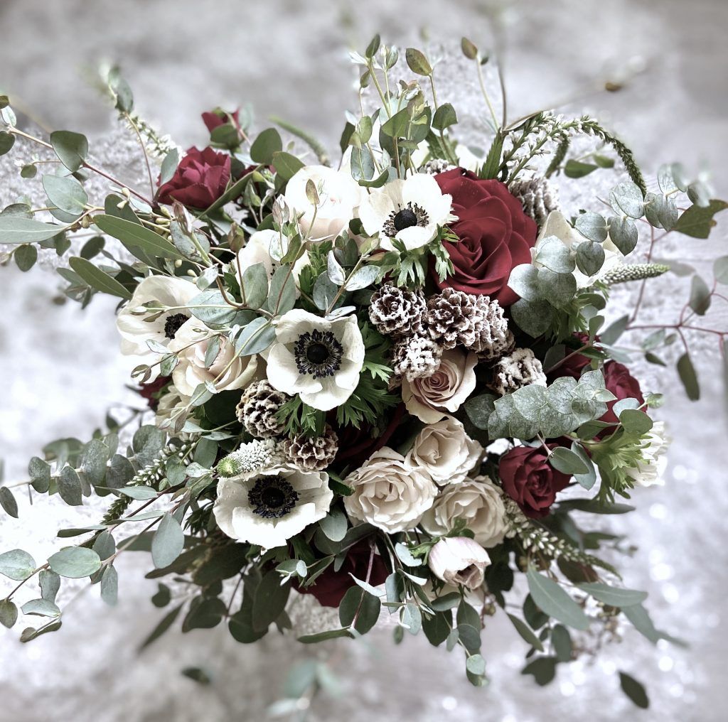 A close up of a bouquet of flowers on a table