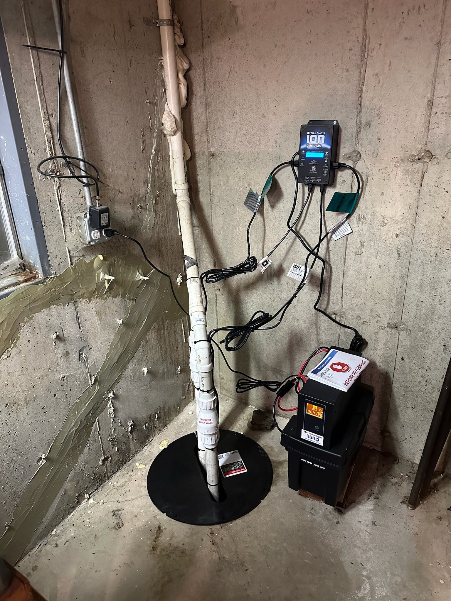 Family gathered at a dining table in a kitchen. They are eating and talking together.