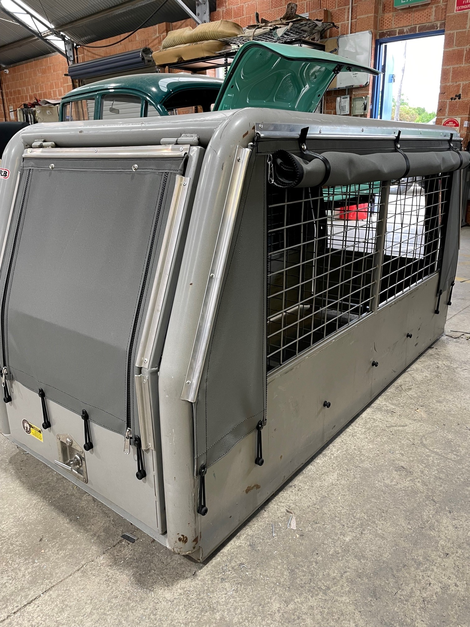 A Silver Ute Cage With A Grey Canopy — Simmons Glass & Trim In Bathurst, NSW