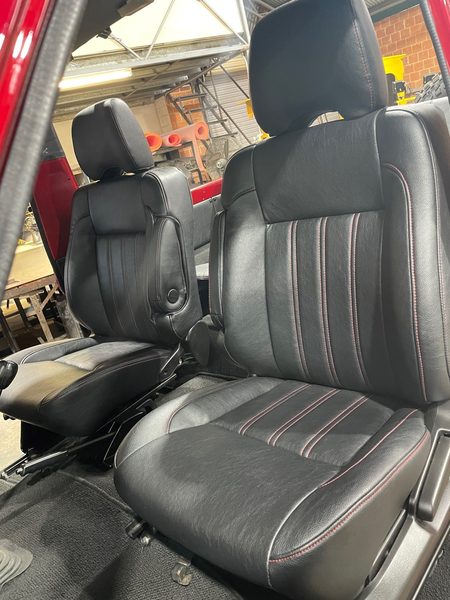 Two Car Seats With Dark Grey Covers — Simmons Glass & Trim In Bathurst, NSW