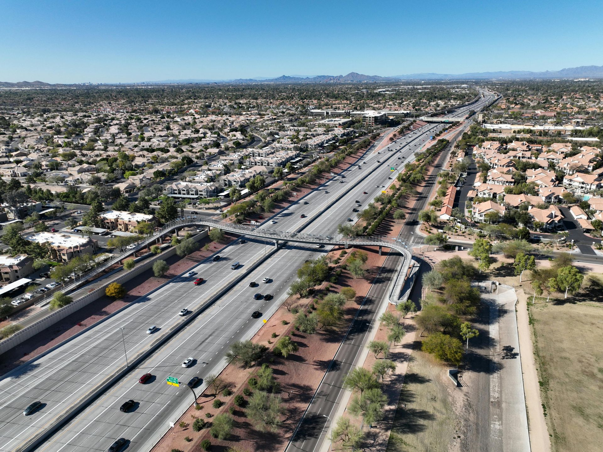 Aerial view of a Gilbert Arizona East Valley suburb and freeway for a local car insurance guide