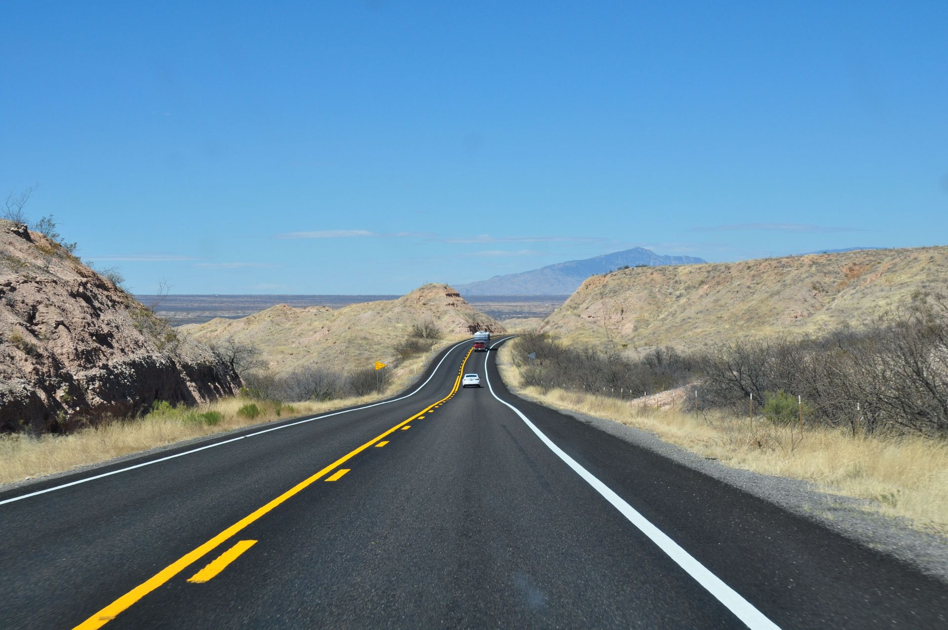 Desert highway in Arizona representing tips for buying car insurance in the state