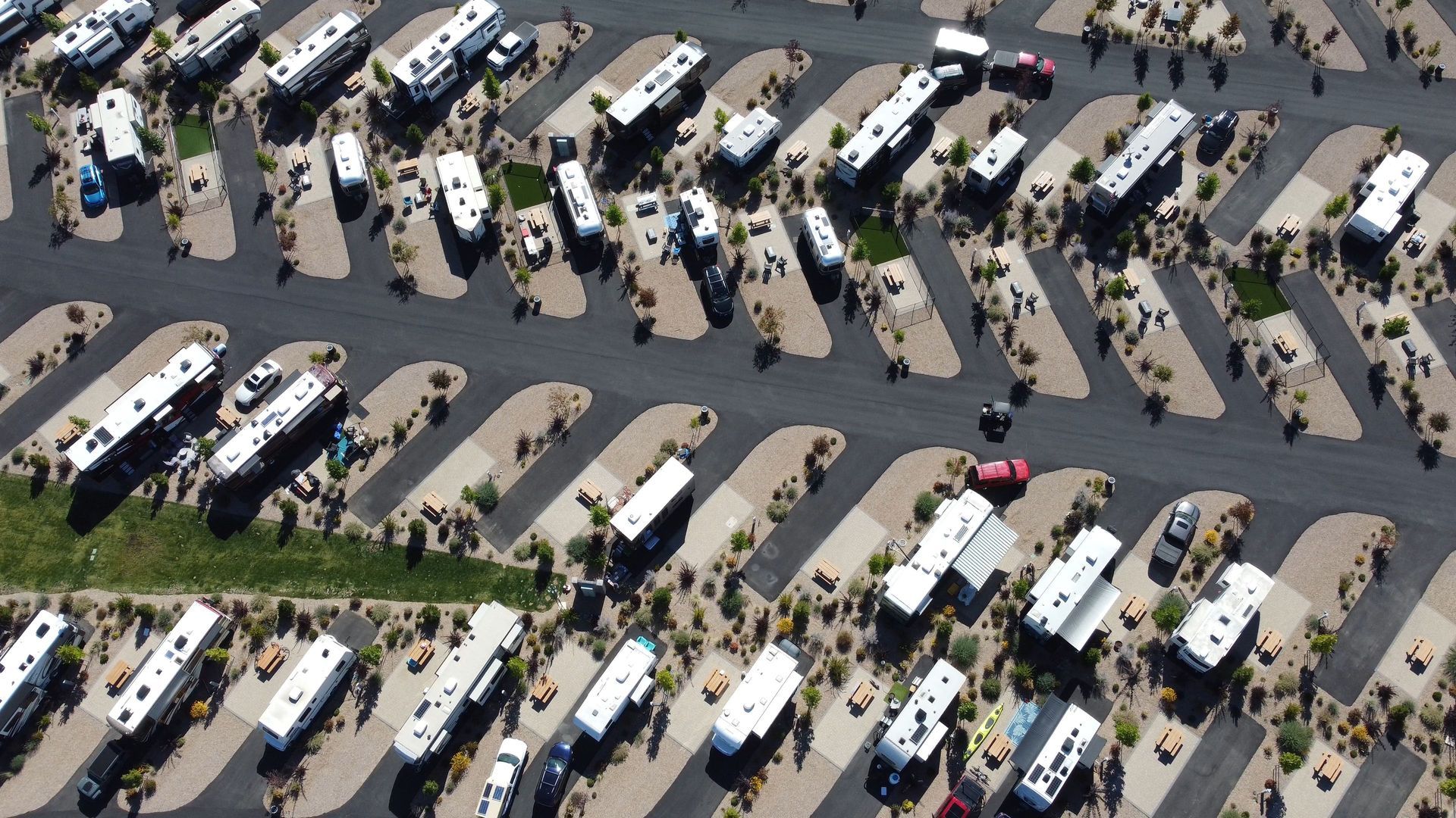 Aerial view of an Arizona mobile home and RV community showing rows of manufactured homes
