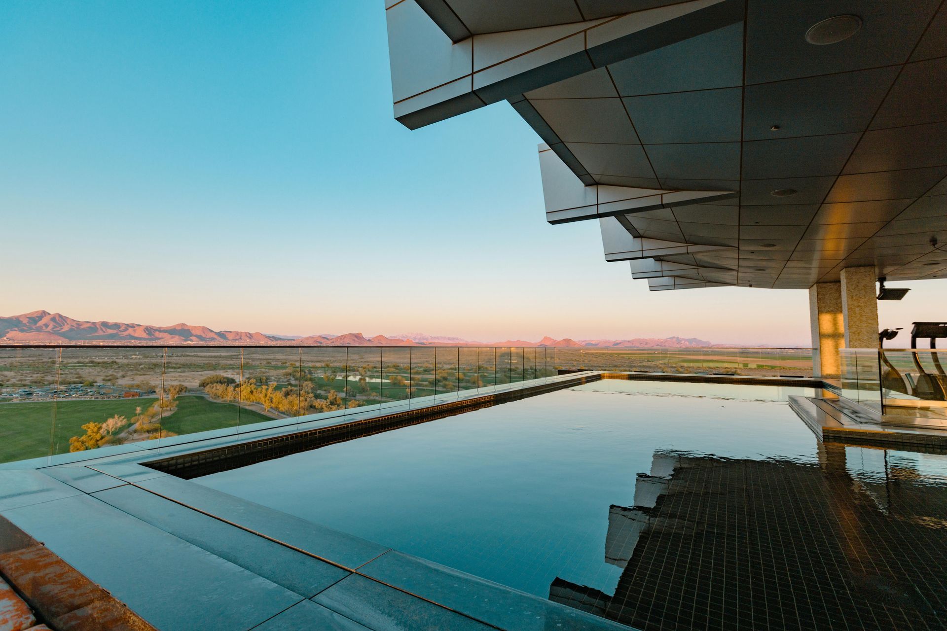 Scottsdale Arizona infinity pool overlooking desert landscape representing luxury home insurance mar