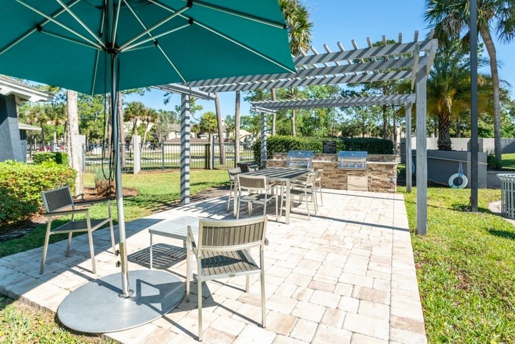 Community outdoor patio with tables and chairs