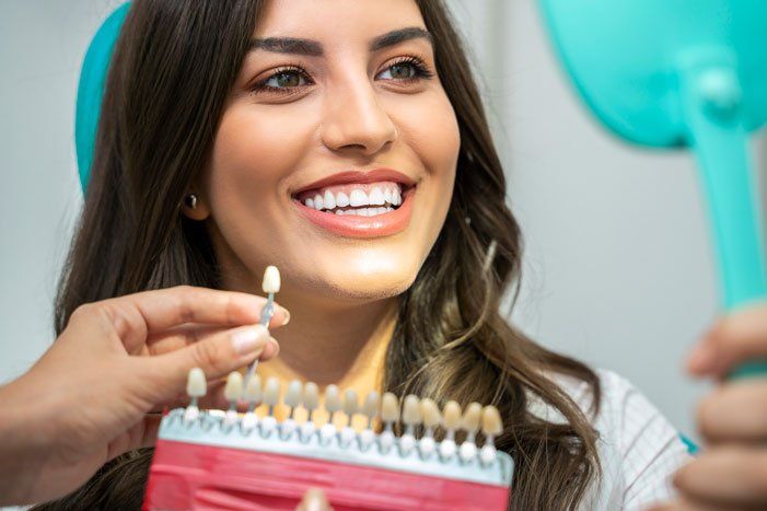 Woman with perfect teeth teeth shade — Wyoming, MI — Dental South