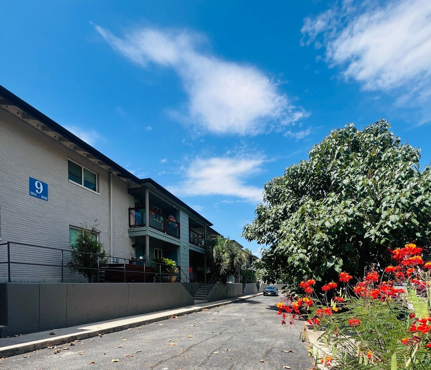 A building with a handicapped sign on the side of it