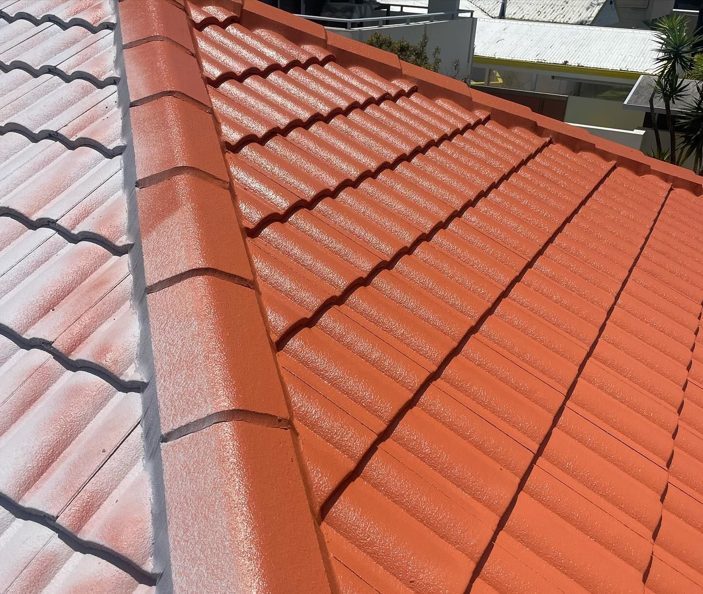 Red Tiled Roof Section With Painted Finish, Close-up Perspective — SEQ Roofing & Painting in Labrador, QLD
