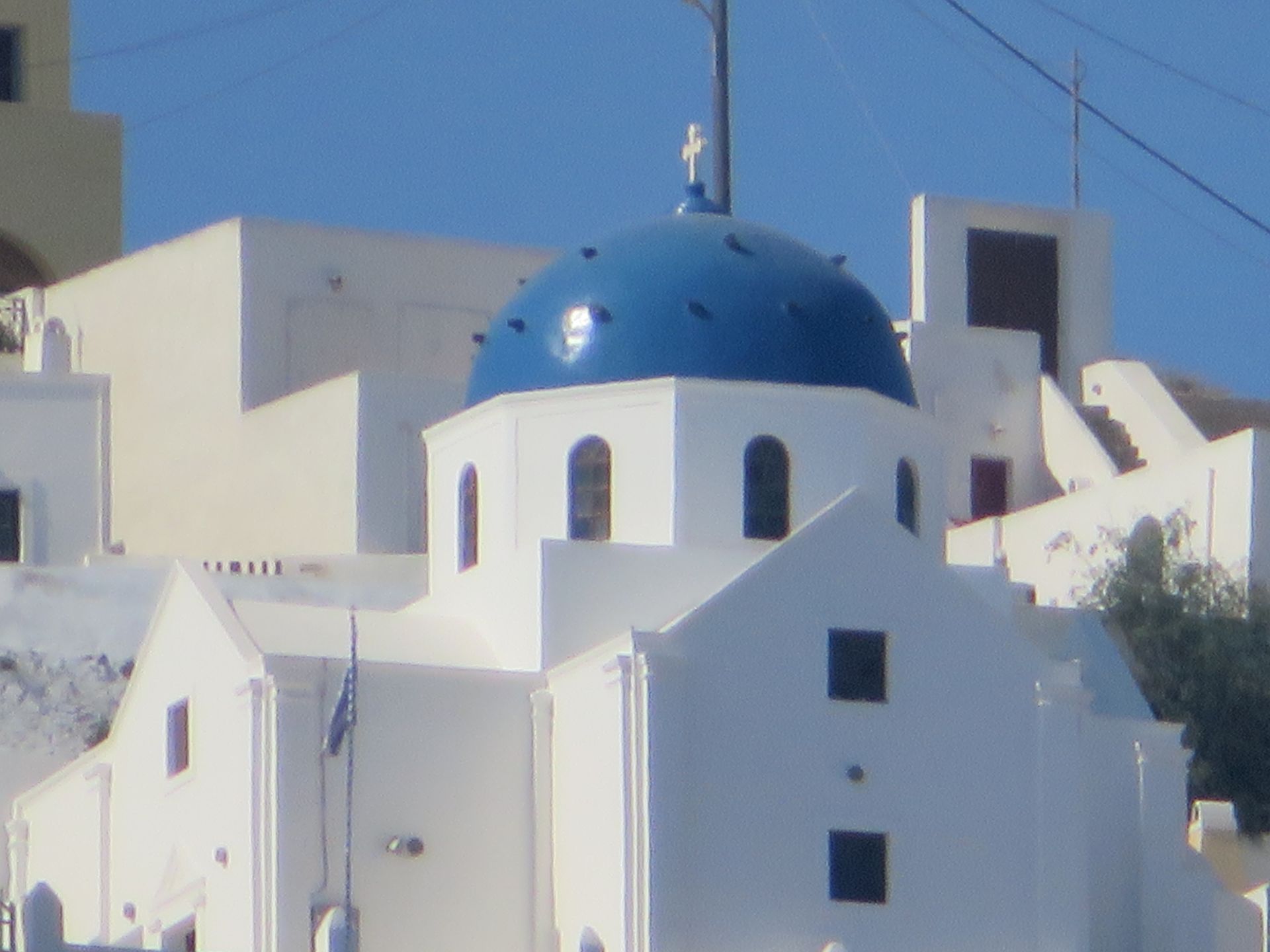 A large wave is breaking in the ocean.