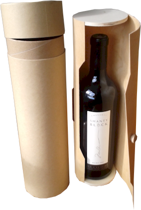 A bottle of wine is in a cardboard box