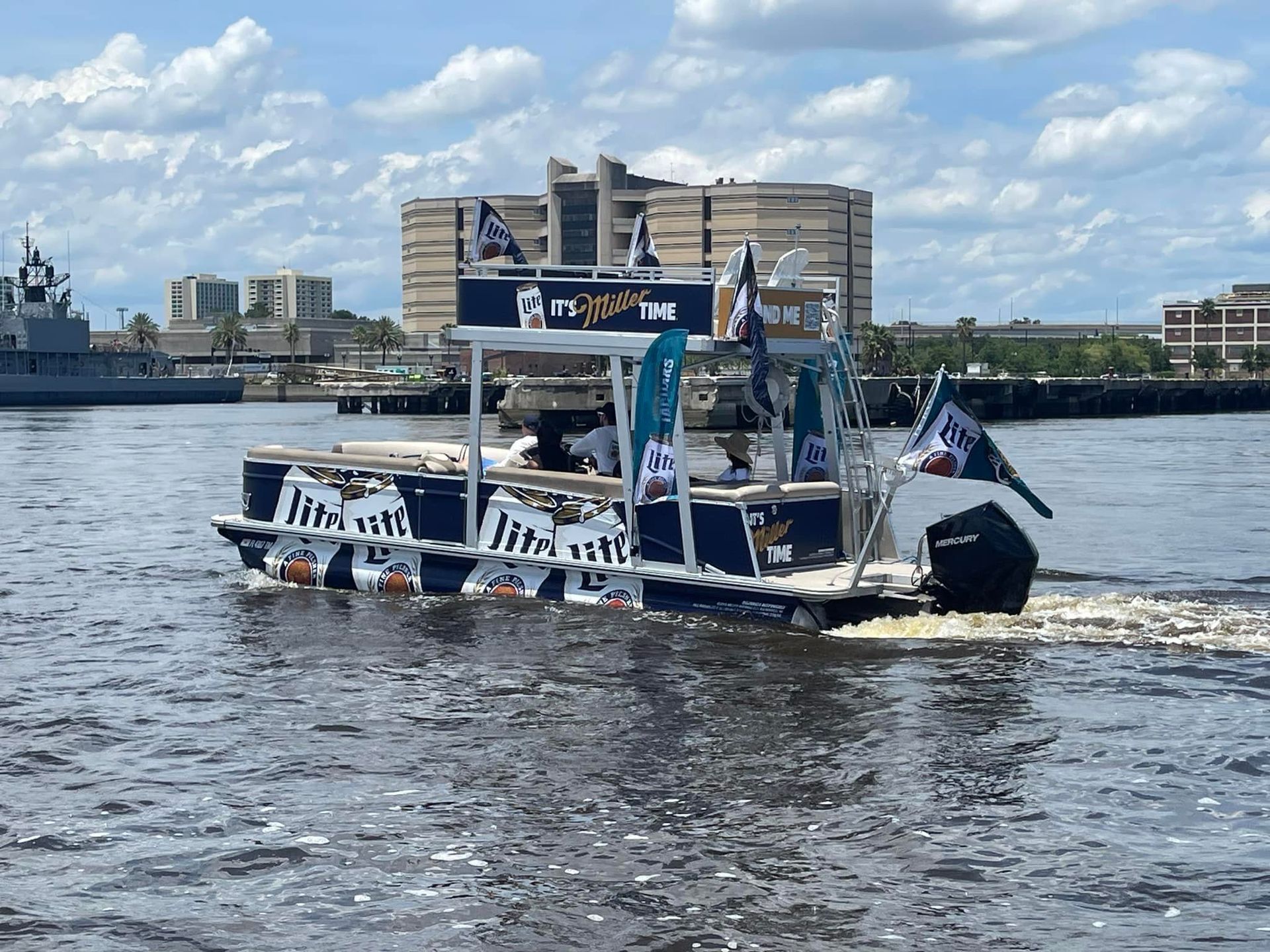 A boat is floating on top of a body of water.