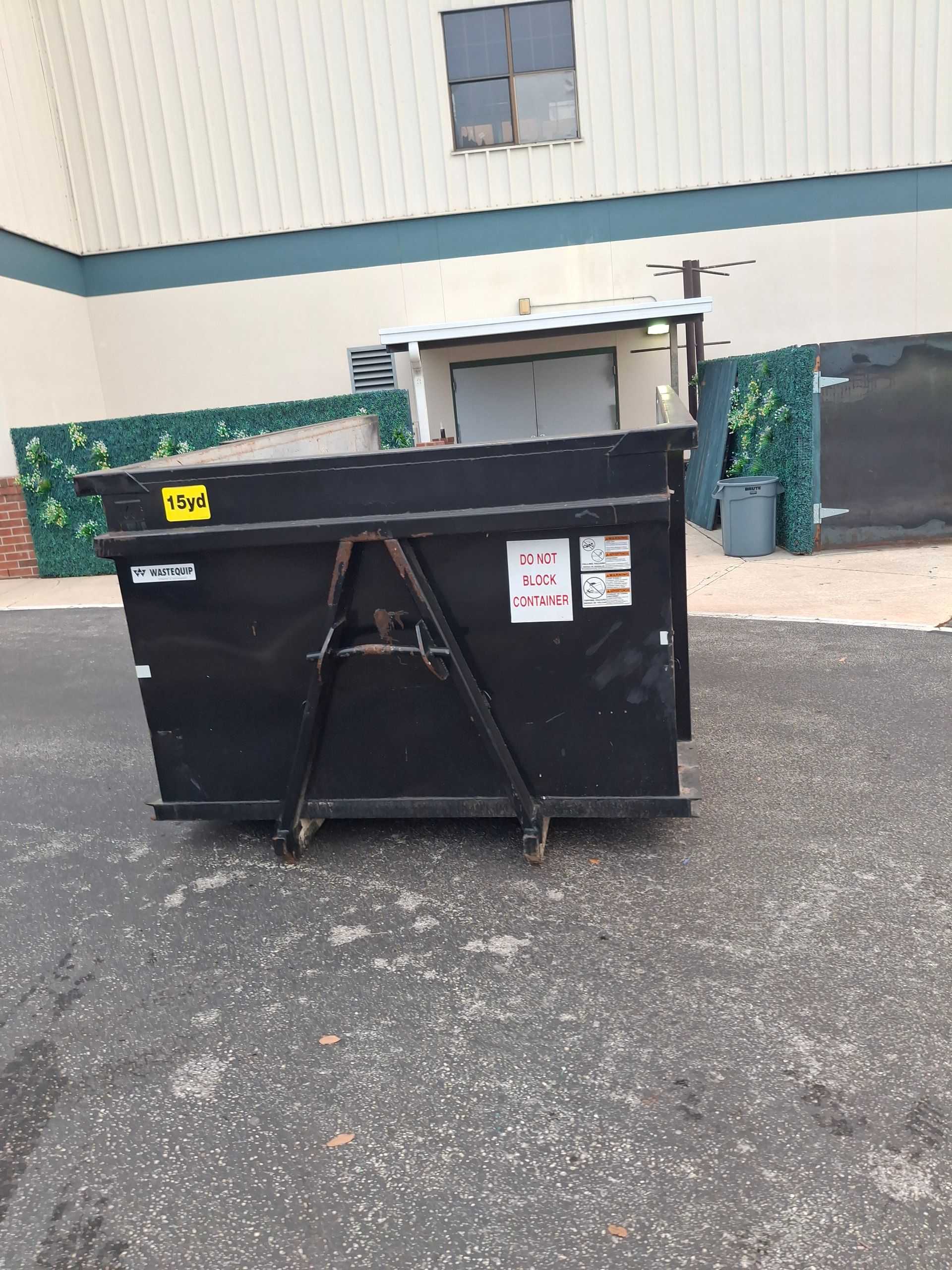 15‑yard dumpster used for a school renovation project in Lakeland, Florida.