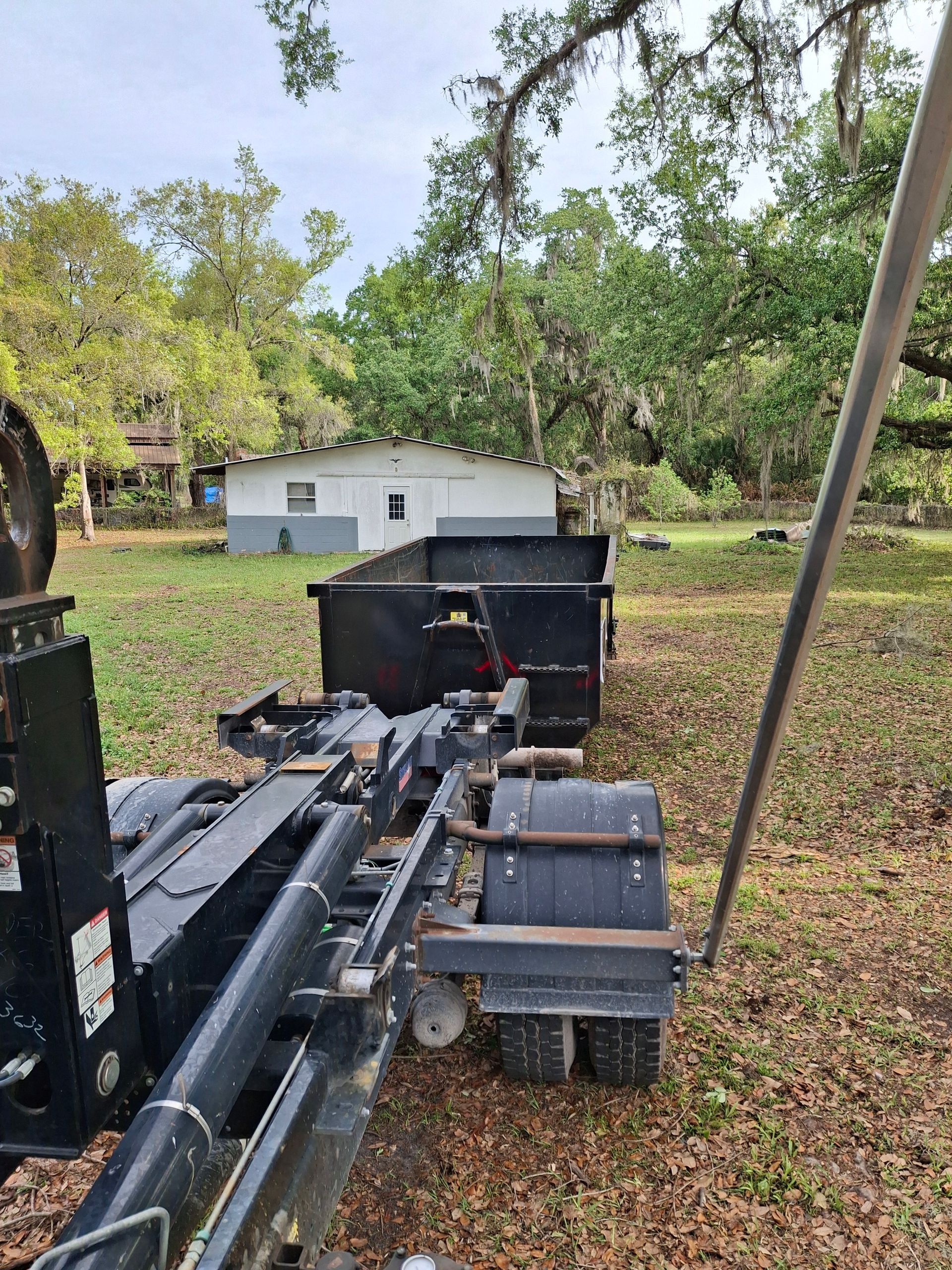 20‑yard dumpster used for a yard debris cleanup in Lakeland, Florida.
