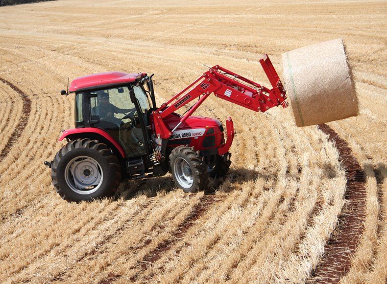 Mahindra Tractor Transporting Hay — Lismore Tractor & Machinery Centre in North Lismore, NSW