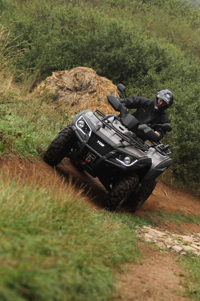 Man Riding Black TGB Quad Bike — Lismore Tractor & Machinery Centre in North Lismore, NSW