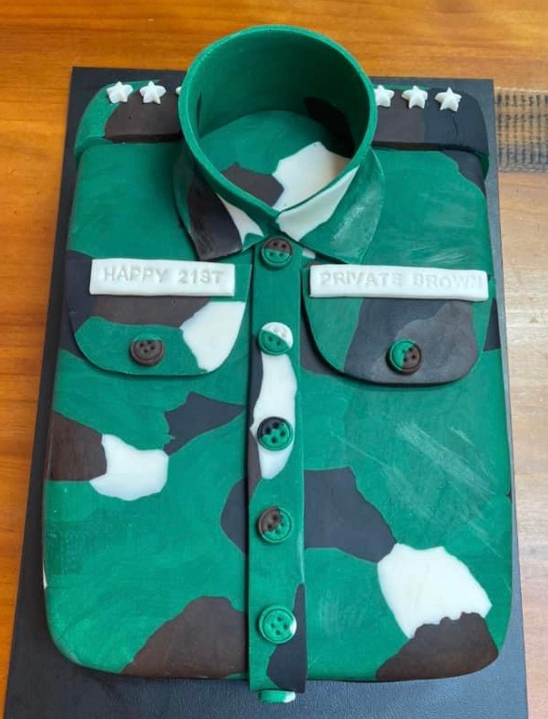 A cake in the shape of a military shirt