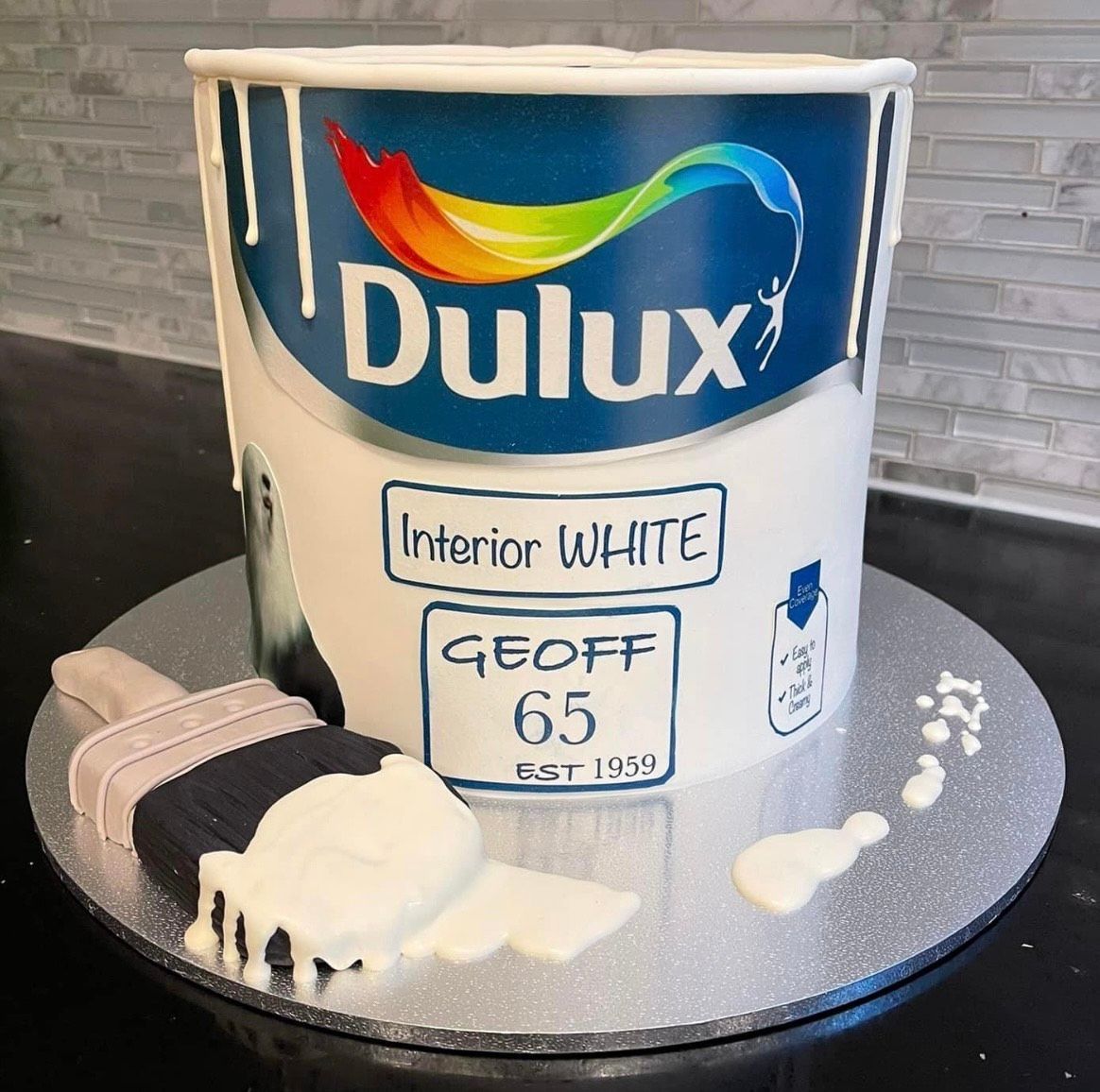 A cake that looks like a can of dulux paint