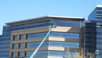 Burnaby Glazing commercial window install with lift from exterior